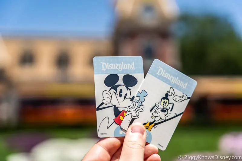 Disneyland Tickets in hand in front of Train Station