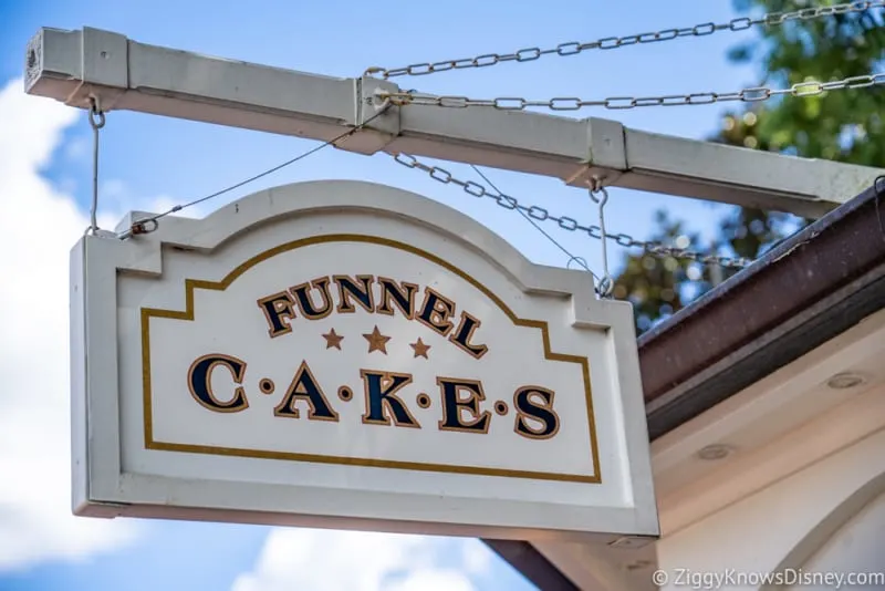 REVIEW Maple Bacon Funnel Cake Epcot sign