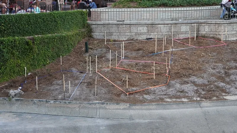 pathway behind Cinderella Castle construction update march 2019 stakes for walkway