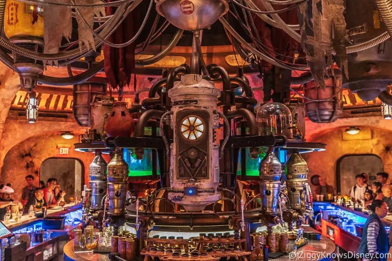 behind the bar in Oga's Cantina
