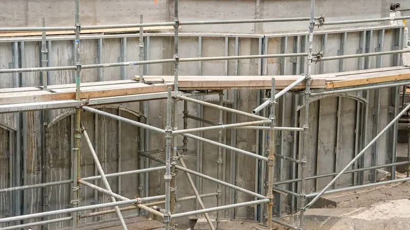 scaffolding around wall for sidewalk expansion Cinderella Castle