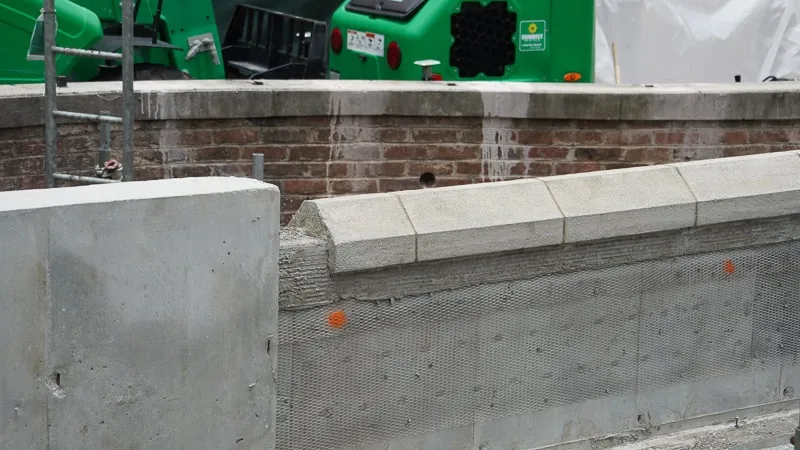 Close up of new wall for sidewalk expansion