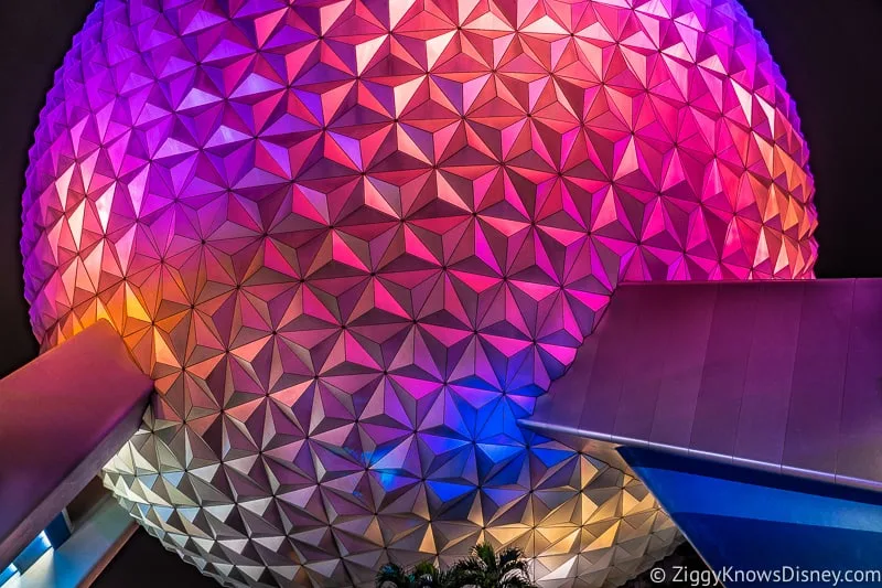 Spaceship Earth glowing at night in Epcot