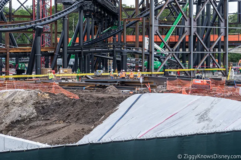 workers on ground TRON Lightcycles Run roller coaster update august 2019