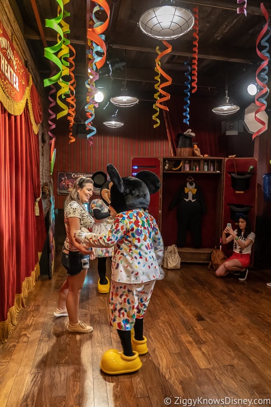 Automatic Cameras replace Mickey and Minnie character town square theater poster inside