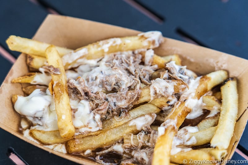 Duck Confit Poutine inside Refreshment Port 2019 Epcot Food and Wine Festival