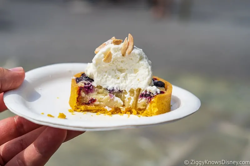 Blueberry almond frangipane tart inside The Alps Epcot Food and Wine Festival 2019