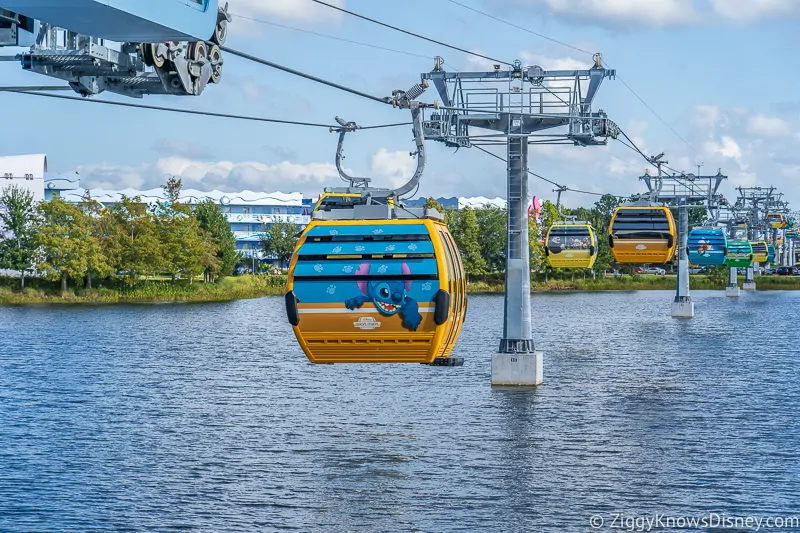 Gondolas over water at Disney Skyliner Gondola Stations Pop Century Art of Animation