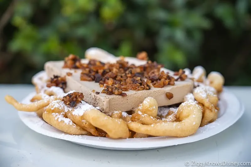 Funnel cake with ice cream American Adventure Best Snacks at Epcot