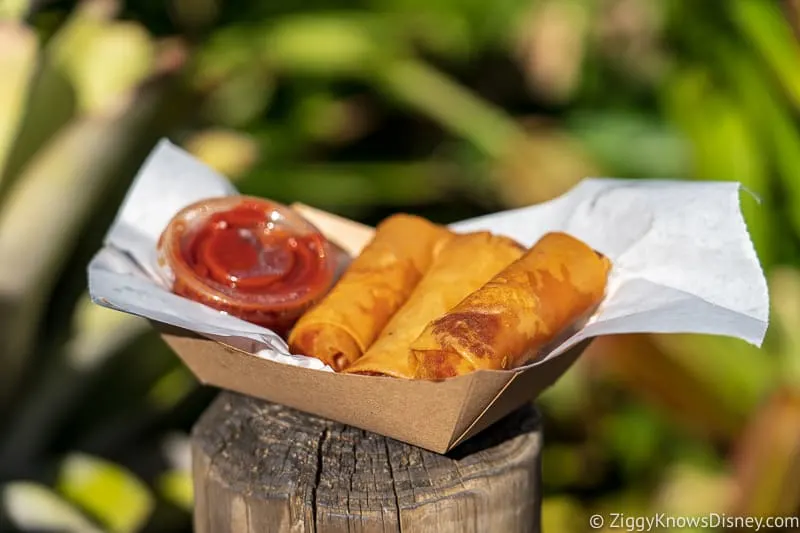 cheeseburger and pepperoni spring rolls in adventureland Best Snacks at Magic Kingdom