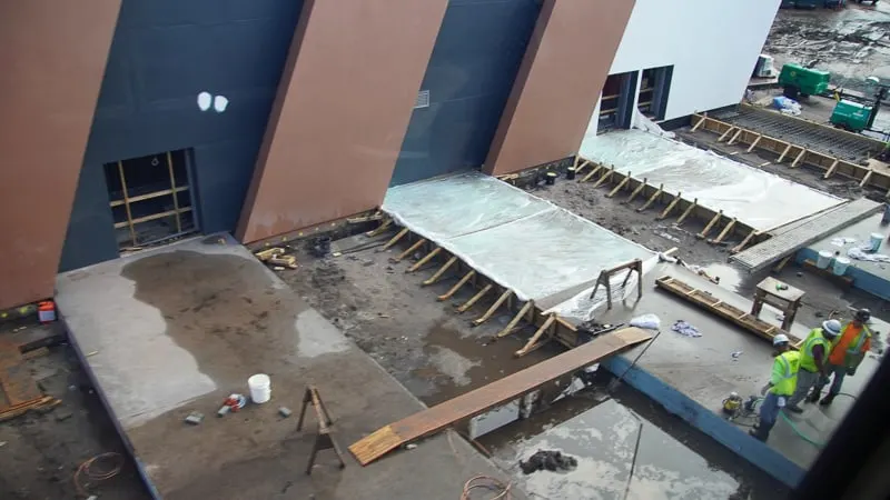 concrete being poured on the side of outside the building Guardians of the Galaxy coaster
