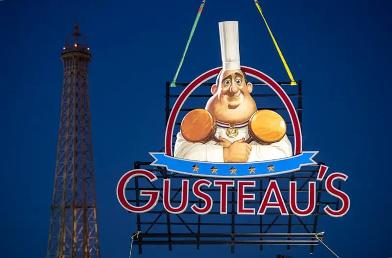 Gusteau's Sign Epcot France pavilion at night