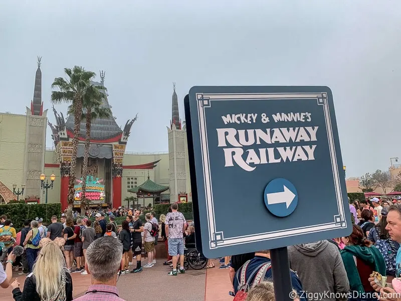 Sign for Mickey and Minnie's Runaway Railway queue