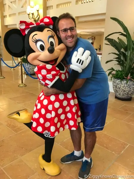 Getting hug from Minnie Mouse Disney Check-In