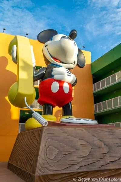 Giant Mickey Mouse statue with telephone in Disney World