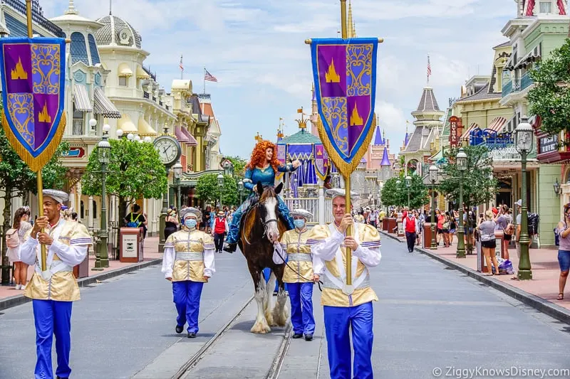 Merida riding a horse down Main Street U.S.A. Magic Kingdom opening