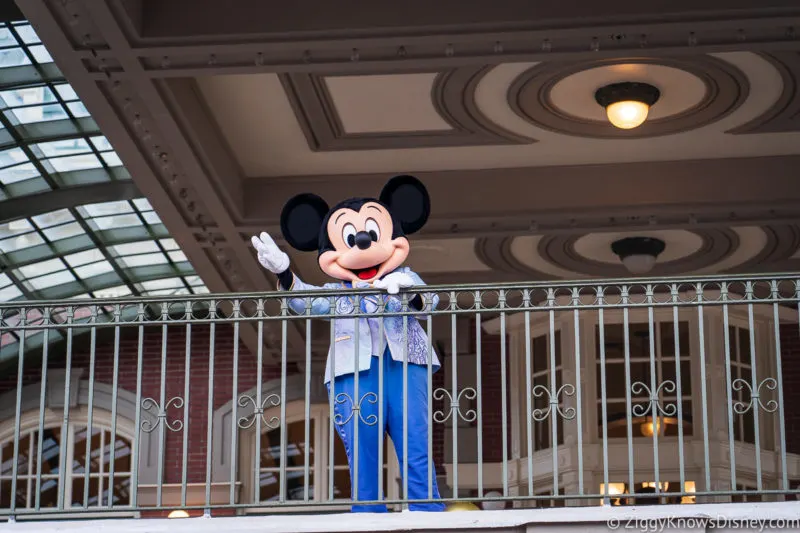 Mickey Mouse greeting guests at Magic Kingdom