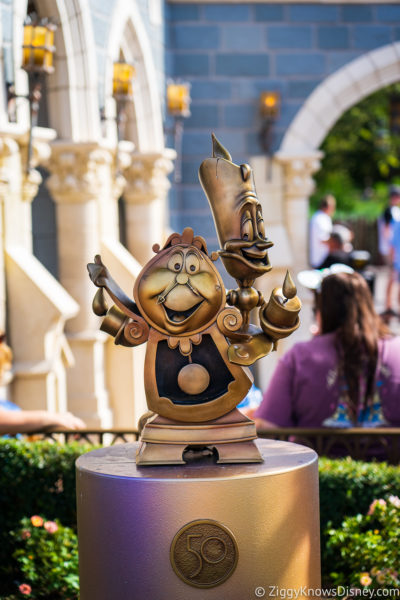 Cogsworth and Lumiere Disney World 50th Anniversary Golden Statues Magic Kingdom
