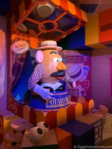 Mr. Potato head in line at Toy Story Mania