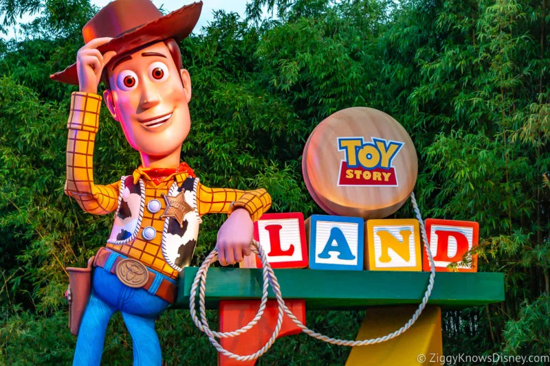 Woody statue standing outside Toy Story Land in Hollywood Studios