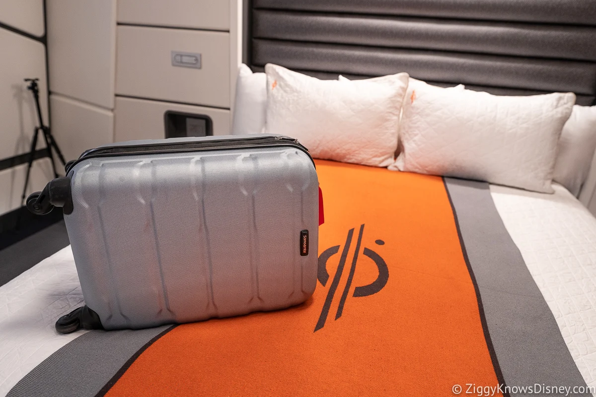 Suitcase on bed at Star Wars: Galactic Starcruiser