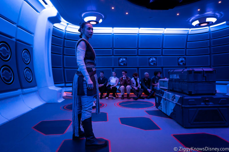Rey in the Lightsaber Training Pod giving mission briefing