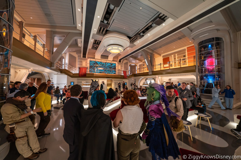 Guests and characters gathering in the Atrium