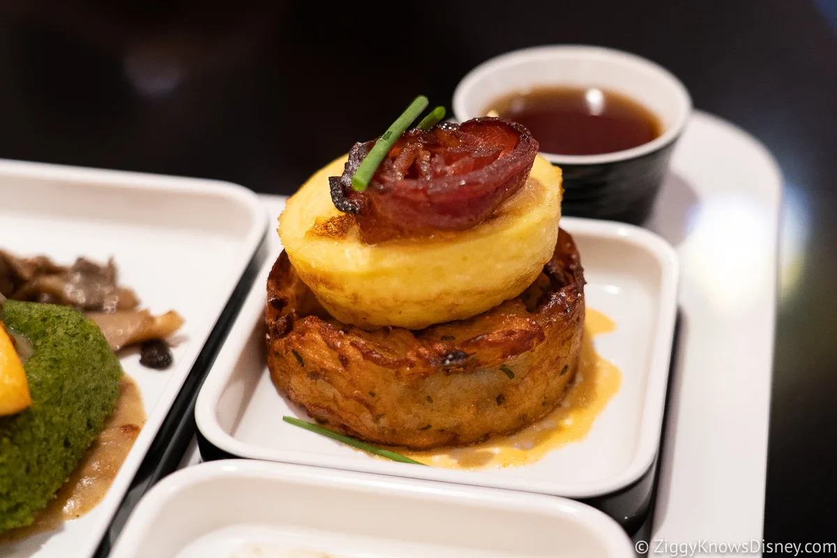 Egg Bite with Potato Rosti Bacon Bullet Sauce Choron Crown of Corellia Dining Room