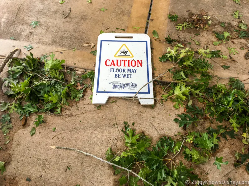 Caution sign and damage after Disney World hurricane