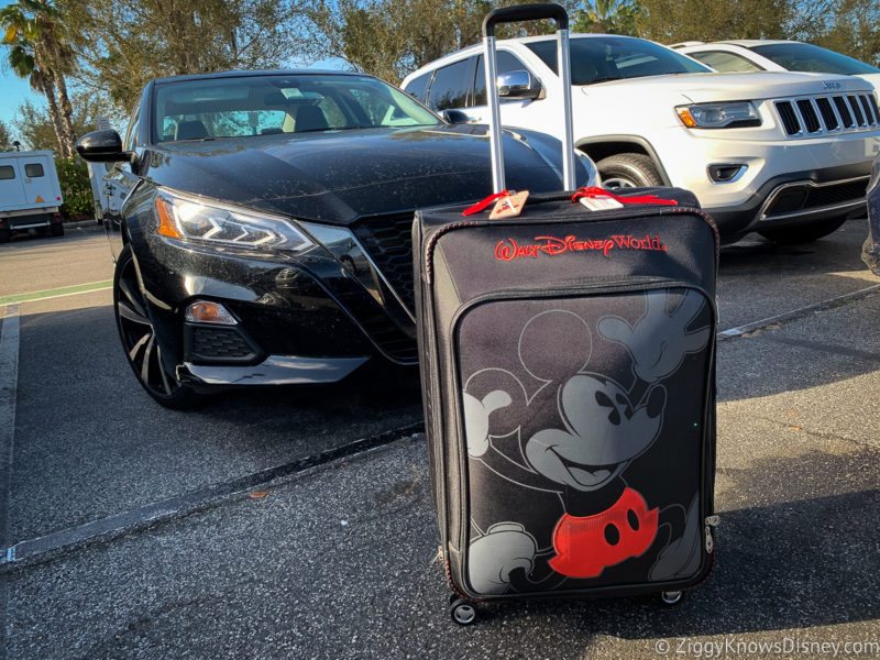 luggage outside car going from airport to Disney World