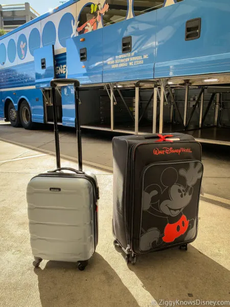luggage outside bus shuttle from airport to Disney World