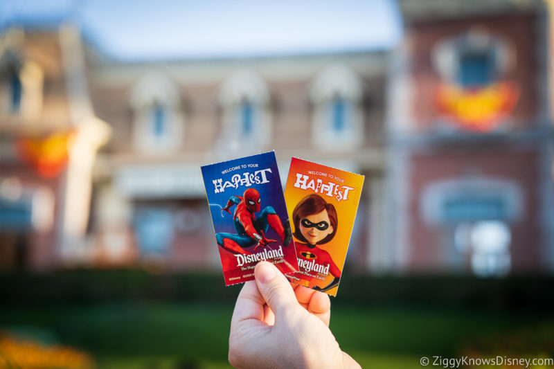 holding up tickets in Disneyland