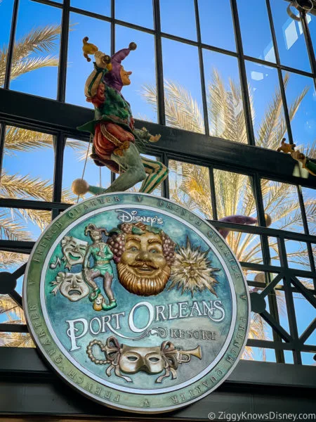 Disney's Port Orleans Resort - French Quarter sign with Joker in front of windows
