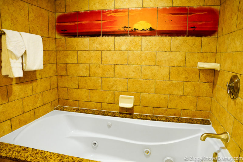 Disney's Animal Kingdom Lodge bathtub with Lion King painting