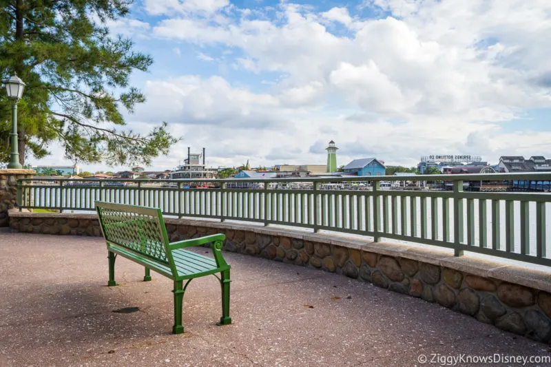 green bench overlooking the water Disney's Saratoga Springs Resort