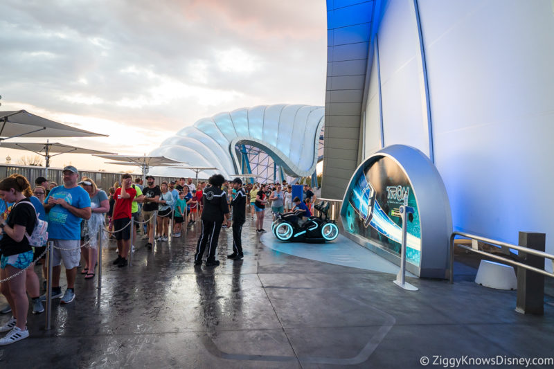 trying ride vehicles outside TRON Lightcycle Run