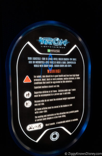safety warnings sign TRON LIghtcycle Run queue