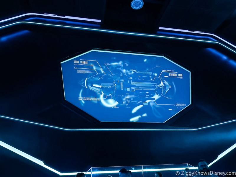 videos on the wall of loading area TRON Lightcycle Run