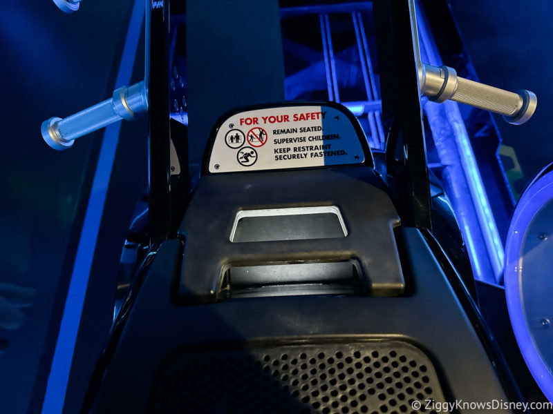 storage compartment on ride vehicle for TRON Lightcycle Run
