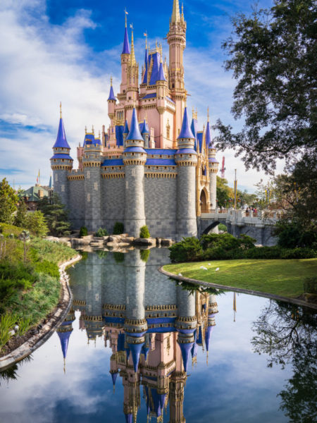 Cinderella Castle Magic Kingdom with reflection in water