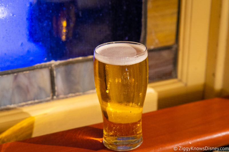 a glass of beer on a window sill Tony's Town Square Restaurant Magic Kingdom