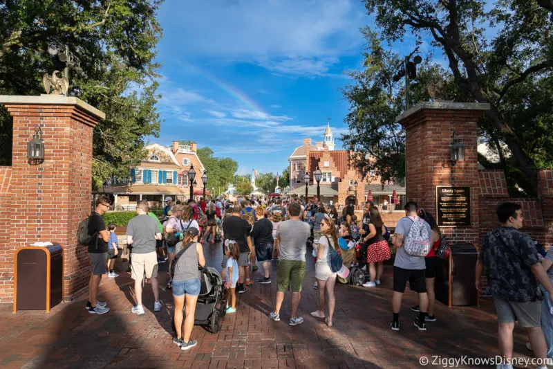 crowds at the entrance to Liberty Square Magic Kingdom rope drop