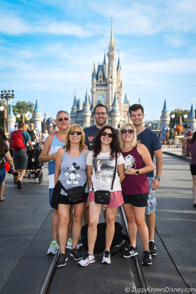 family photopass photo in front of Cinderella Castle Magic Kingdom