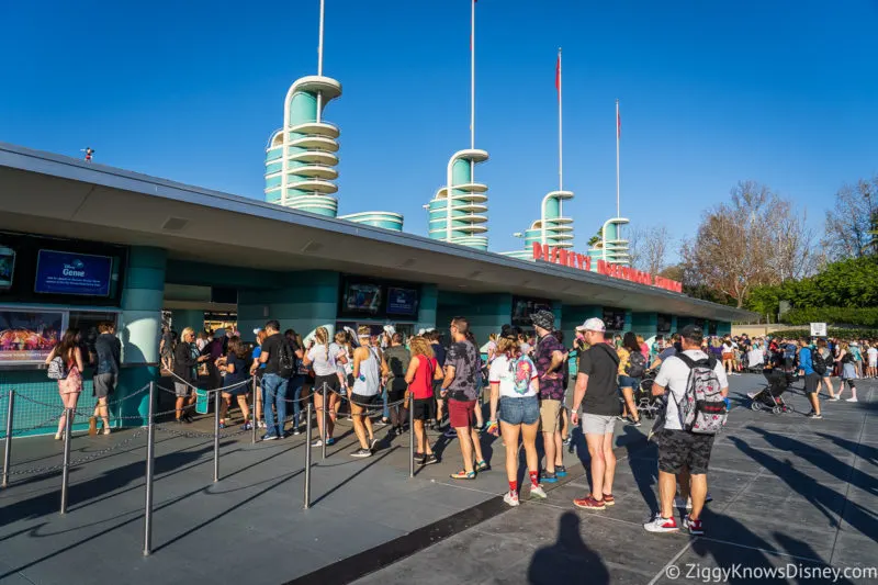 guests walking into Hollywood Studios entrance crowds