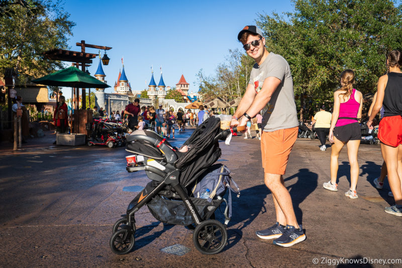 Dan pushing a stroller at Magic Kingdom