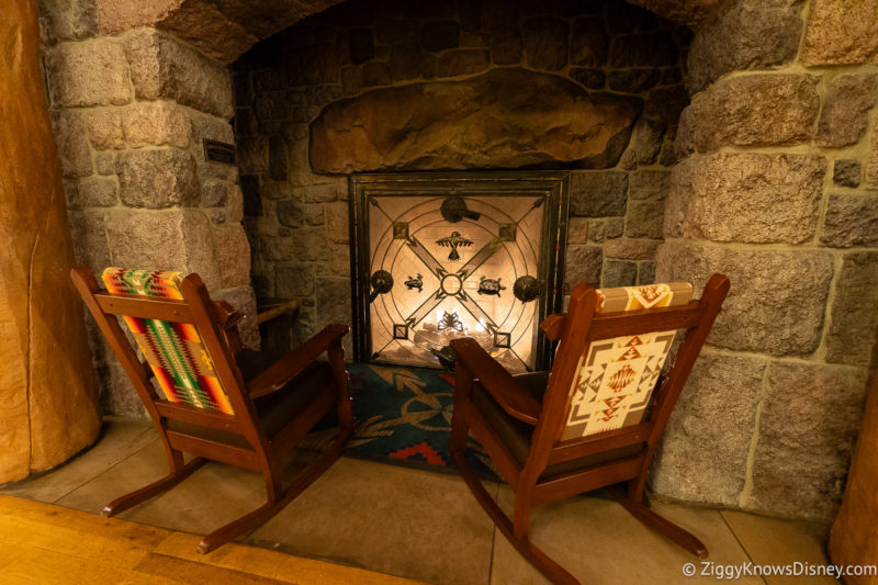two rocking chairs around the fireplace Disney's Wilderness Lodge Resort