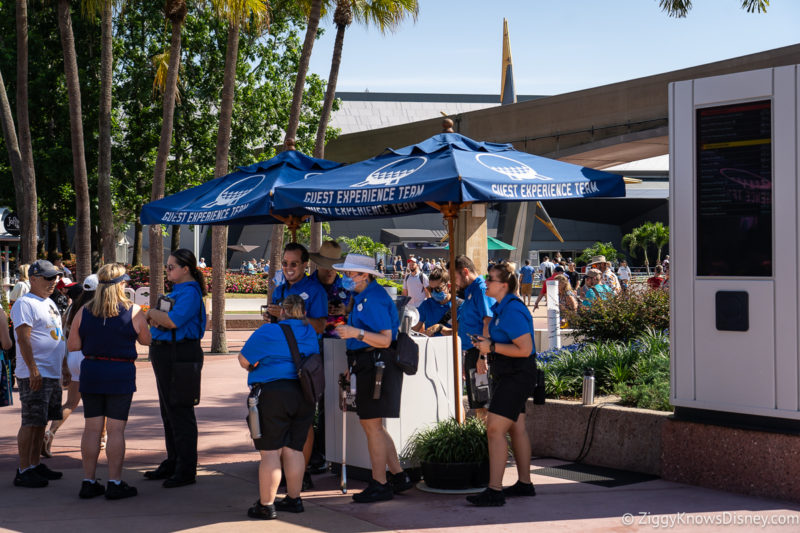 Guest Experience Team blue umbrella stand