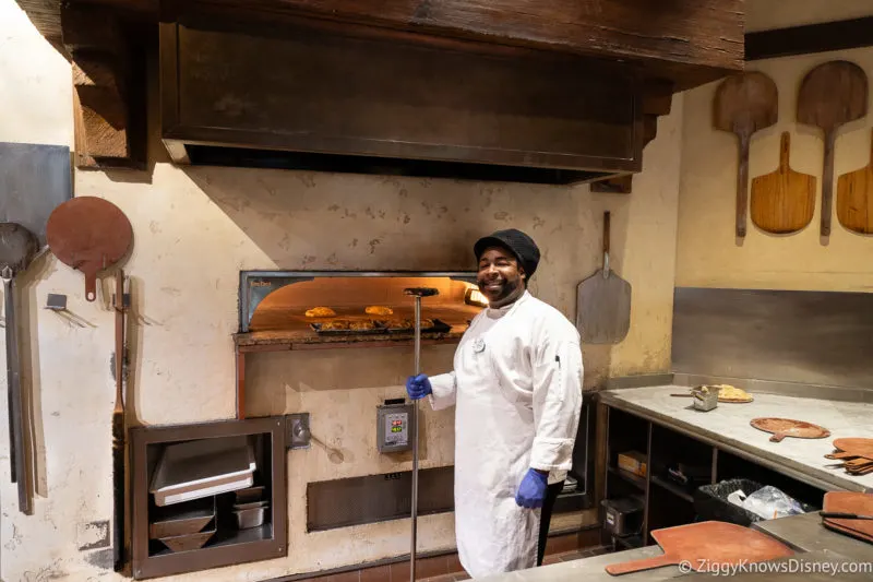 chef baking bread at Trattoria al Forno