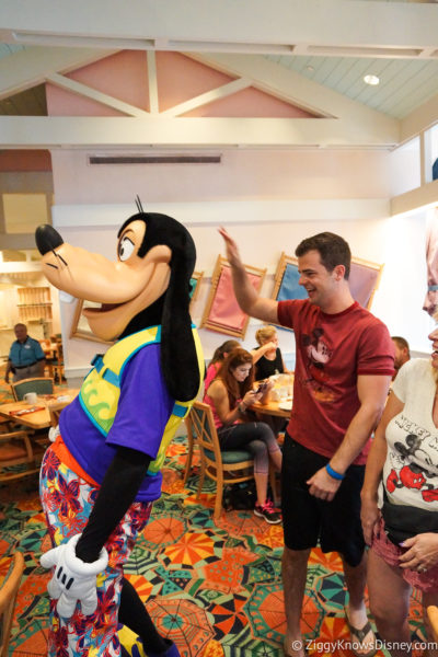 slapping Goofy high five at Cape May Cafe Disney's Beach Club Resort