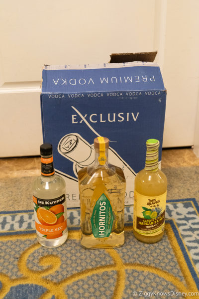 box of alcohol in front of hotel room door